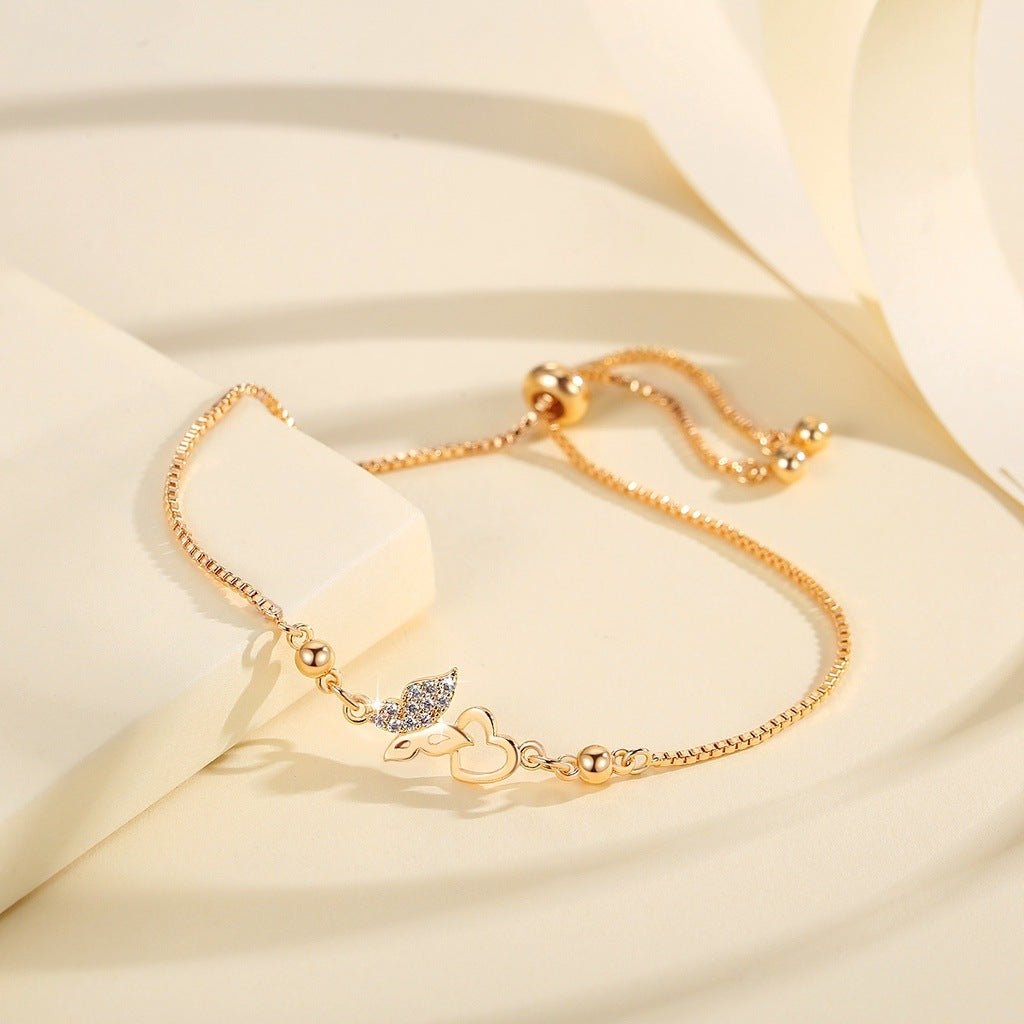 Bracelet Papillon et Cœur en Plaqué Or – L'Élégance Incontournable pour Femme - KadooKadooDoréCJSL214895801AZMykadoo.shopBracelet