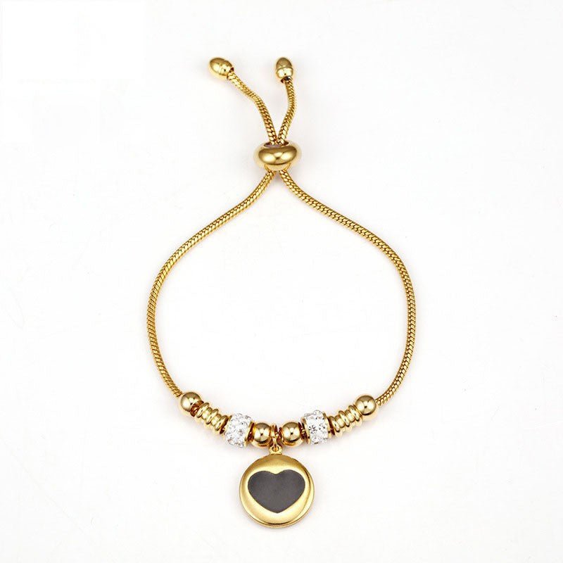 Bracelet Protecteur en Acier Titane Orné d’un Charme Œil Protecteur – Élégance et Symbolisme - KadooKadooOr Cœur NoirCJSL214688604DWMykadoo.shop