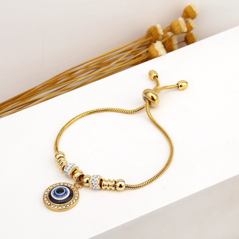 Bracelet Protecteur en Acier Titane Orné d’un Charme Œil Protecteur – Élégance et Symbolisme - KadooKadooOr Cœur NoirCJSL214688604DWMykadoo.shop